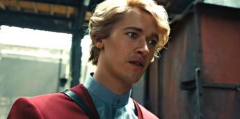 Snow com terno vermelho em Jogos Vorazes