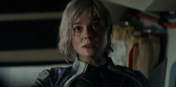 Predador e Elle Fanning