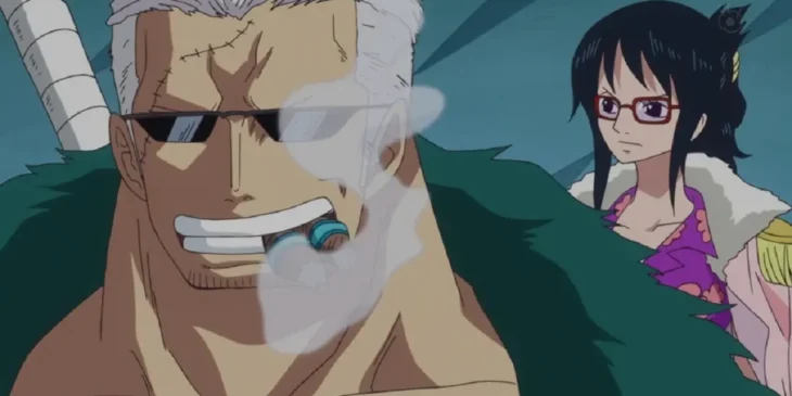 Smoker e Tashigi em cena de One Piece