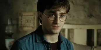 Daniel Radcliffe no papel de Harry Potter