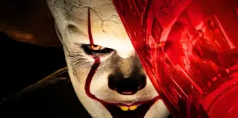 Pennywise com balão vermelho em IT Bem-Vindos a Derry