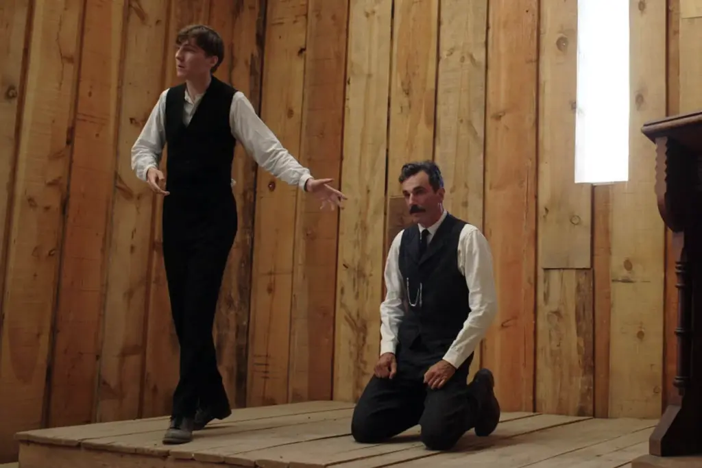 Paul Dano e Daniel Day-Lewis em Sangue Negro