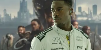 Damson Idris, com fundo de Pantera Negra