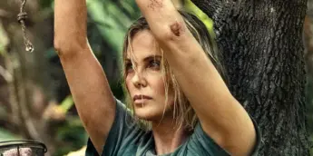 Charlize Theron é Sasha em O Jogo do Predador