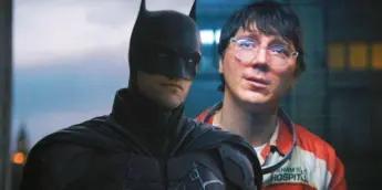 Robert Pattinson como Batman e Paul Dano como Charada