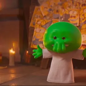 Goomi, com voz original de Trey Parker, em Minions & Monstros