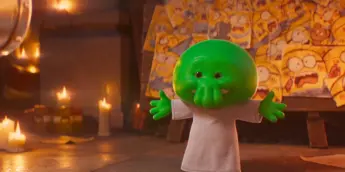 Goomi, com voz original de Trey Parker, em Minions & Monstros