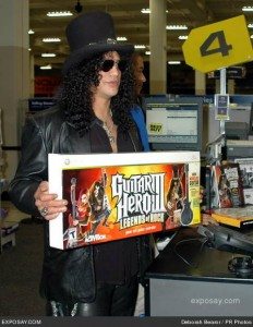 rock-star-slash-sells-guitar-hero-iii-to-the-first-fans-in-line-at-the-launch-party-for-guitar-hero-iii-legends-of-rock-prese-jcW6Hg